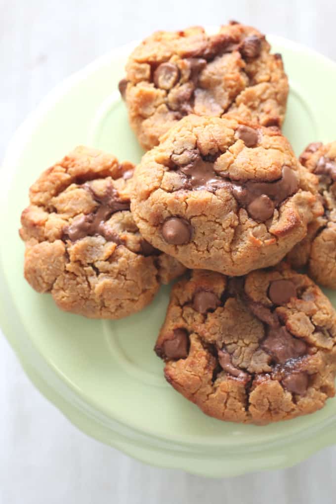 Chickpea & Nutella Cookies stacked on a light green cake stand