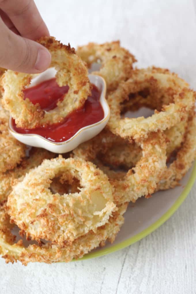 onion rings with a ramekin of ketchup