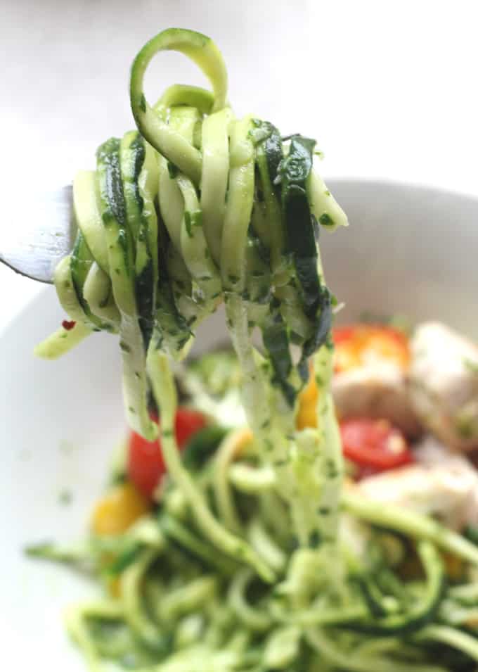 zoodles with creamy pesto on a fork