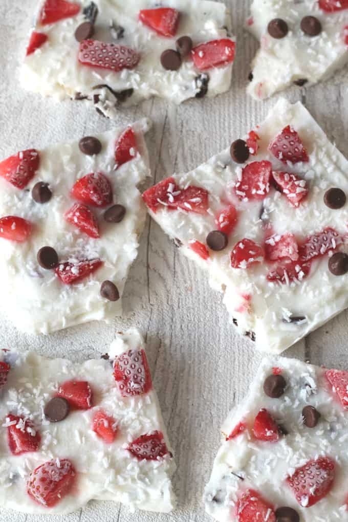 frozen yoghurt bark in shards on a wooden back lay