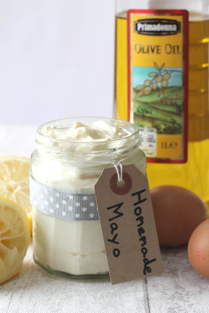 homemade mayo paleo in a glass jar with mayo ingredients in the background