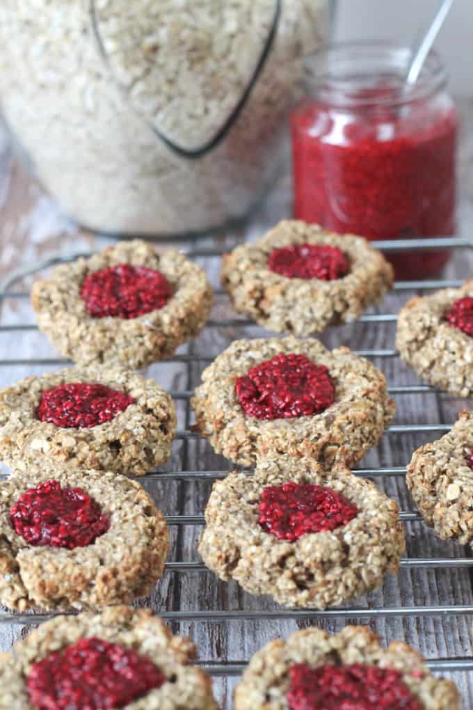 A healthy version of the classic jam thumbprint cookies. Made with oats, bananas & almond milk these cookies are gluten and dairy free with no refined sugar