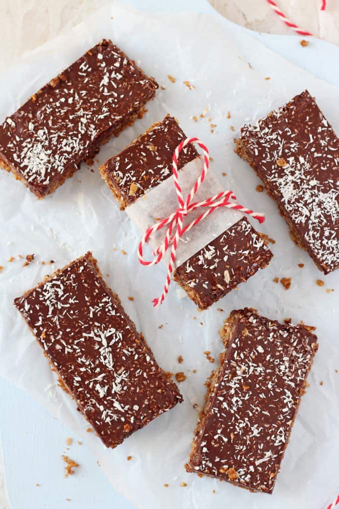 5 slices of Chocolate Coconut Flapjacks on a white background