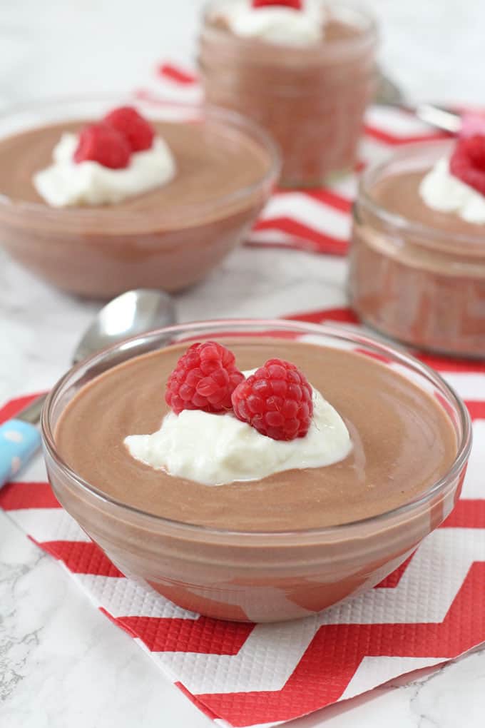 chocolate mousse served with raspberries