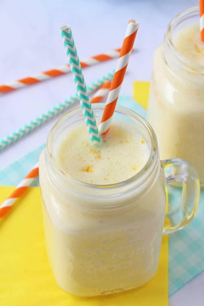 Close up of creamy orange smoothie with orange zest