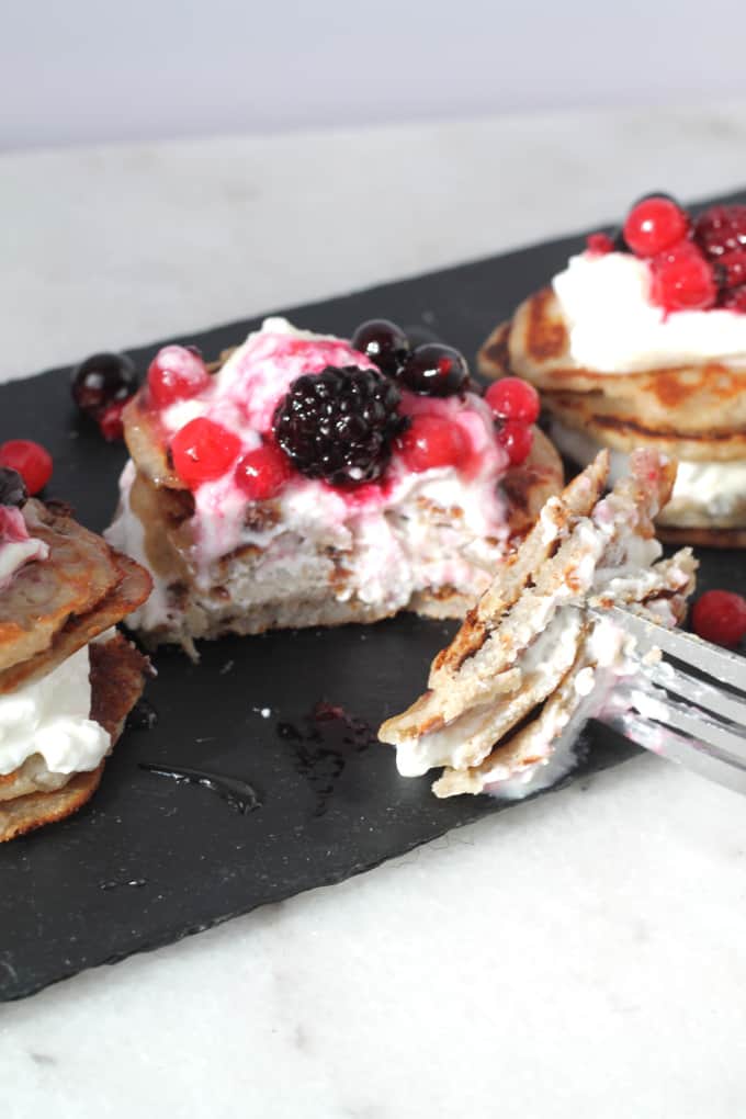 a forkful of mini coconut banana buckwheat pancakes