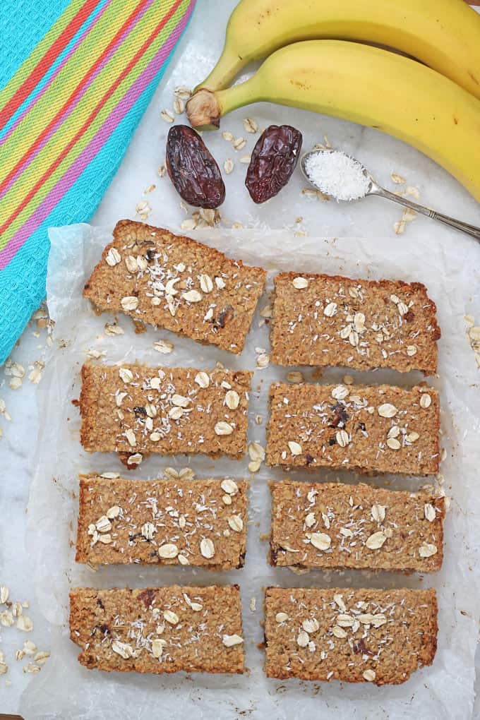 8 slices of Sugar Free Flapjacks Oat Bars for Baby Led Weaning next to some of the ingredients