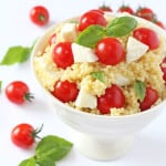 A fresh and colourful summer salad recipe made with giant cous cous, mozarella, cherry tomatoes and basil | My Fussy Eater blog