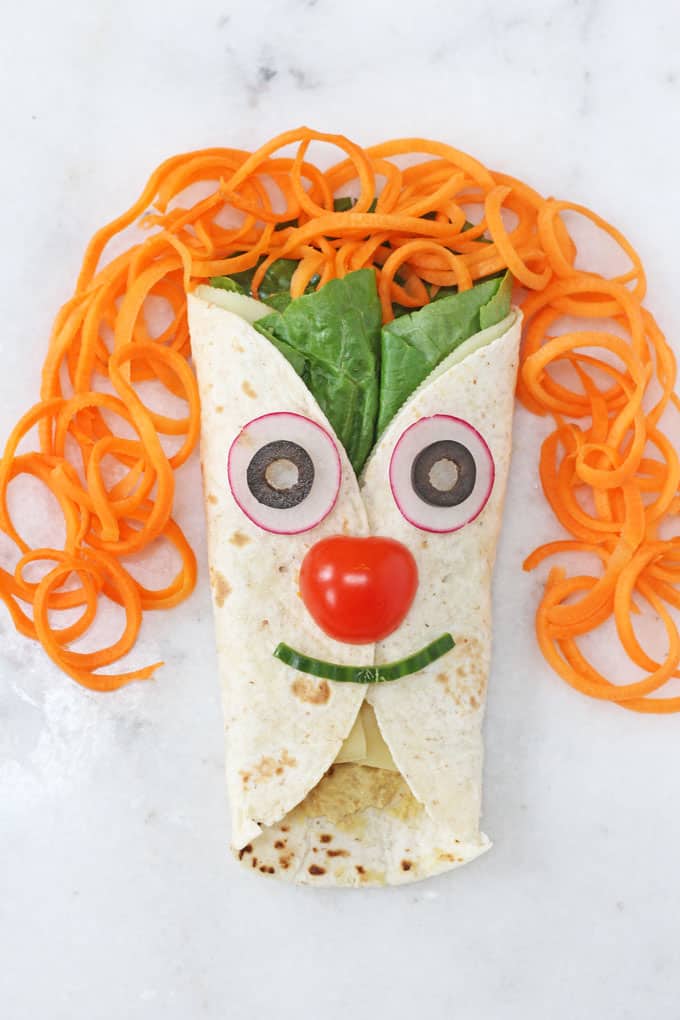 delicious, healthy and fun Cheese, Veggie & Green Olive Hummus wrap for kids