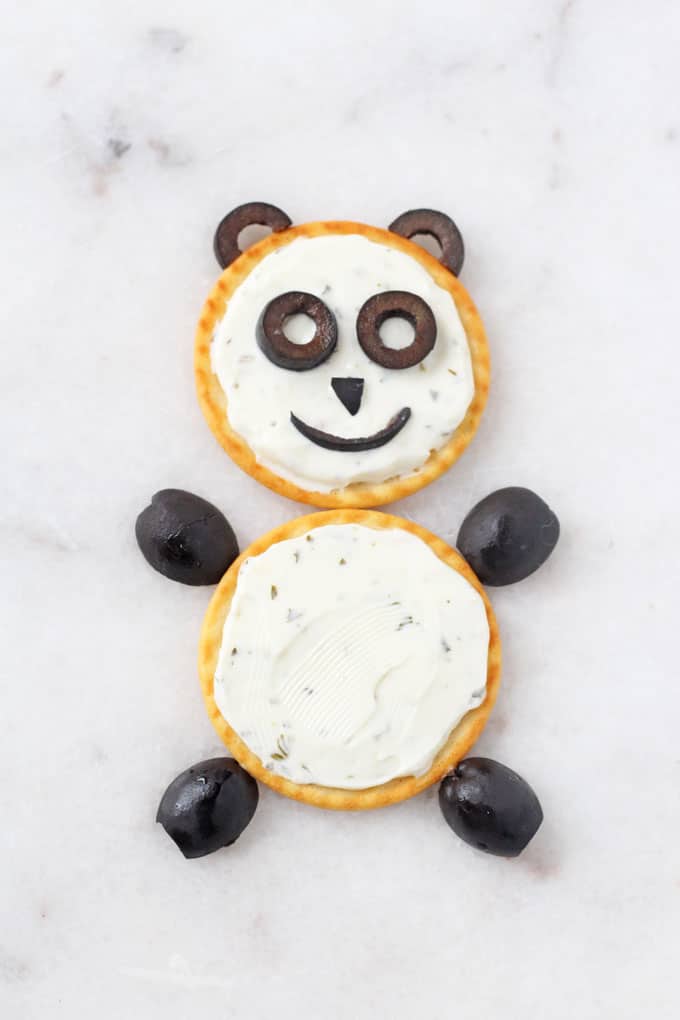 Make a fun and healthy snack for kids with just crackers, black olives and cream cheese | My Fussy Eater blog