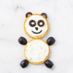 Make a fun and healthy snack for kids with just crackers, black olives and cream cheese | My Fussy Eater blog