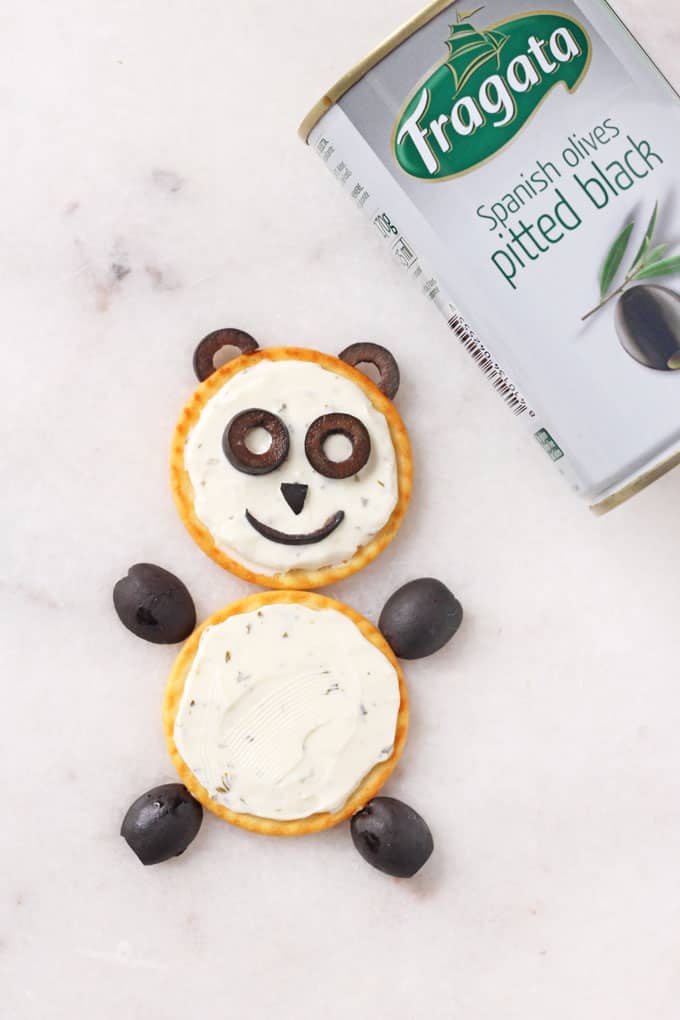 Make a fun and healthy snack for kids with just crackers, black olives and cream cheese | My Fussy Eater blog