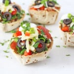 Use up leftover chilli and make these quick and easy Taco Cups filled with green and black olives, cheese and red peppers | My Fussy Eater blog