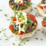 Use up leftover chilli and make these quick and easy Taco Cups filled with green and black olives, cheese and red peppers | My Fussy Eater blog