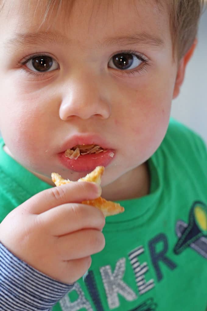 child eating pastry stars