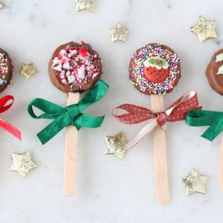 These festive Oreo Pops are coated in chocolate and decorated with Christmas sprinkles and icing decorations. They make a super cute edible gift that kids can make for their friends!