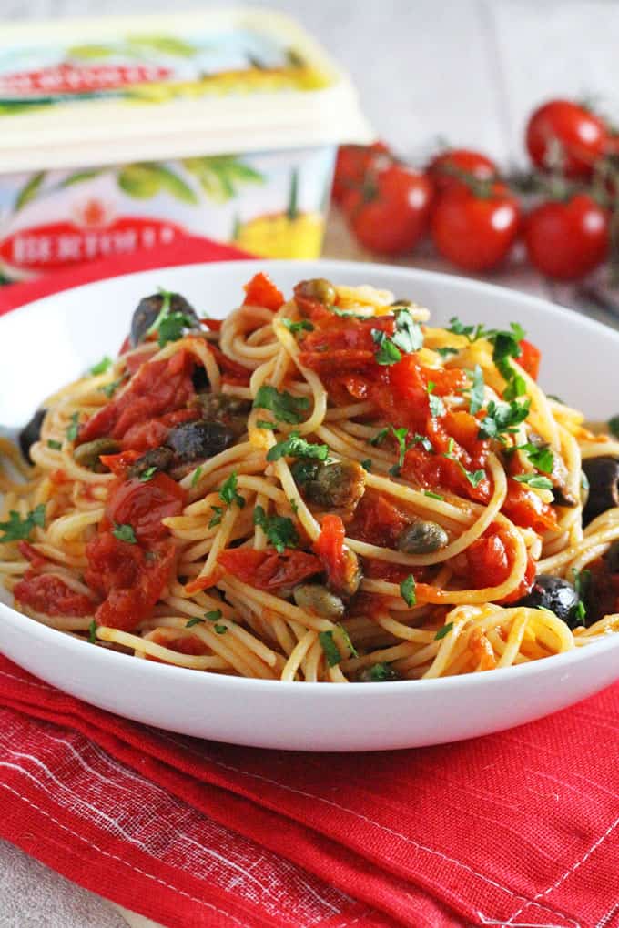 A super delicious and fresh pasta sauce made with Bertolli spread and packed with classic Italian flavours from tomatoes, garlic, capers, anchovies and olives. Really easy to make and sure to be a family hit! 