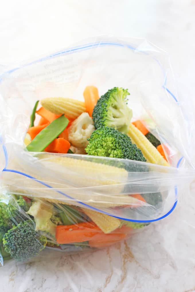 Steaming veggies in the microwave is so quick and easy using my foolproof ziplock bag method! Delicious freshly cooked vegetables that retain all their nutrients in just 3 minutes!