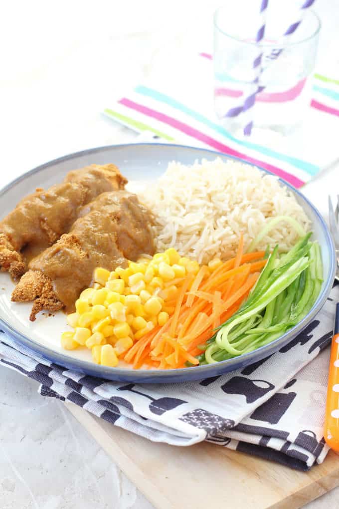 katsu curry served with rice and vegetables