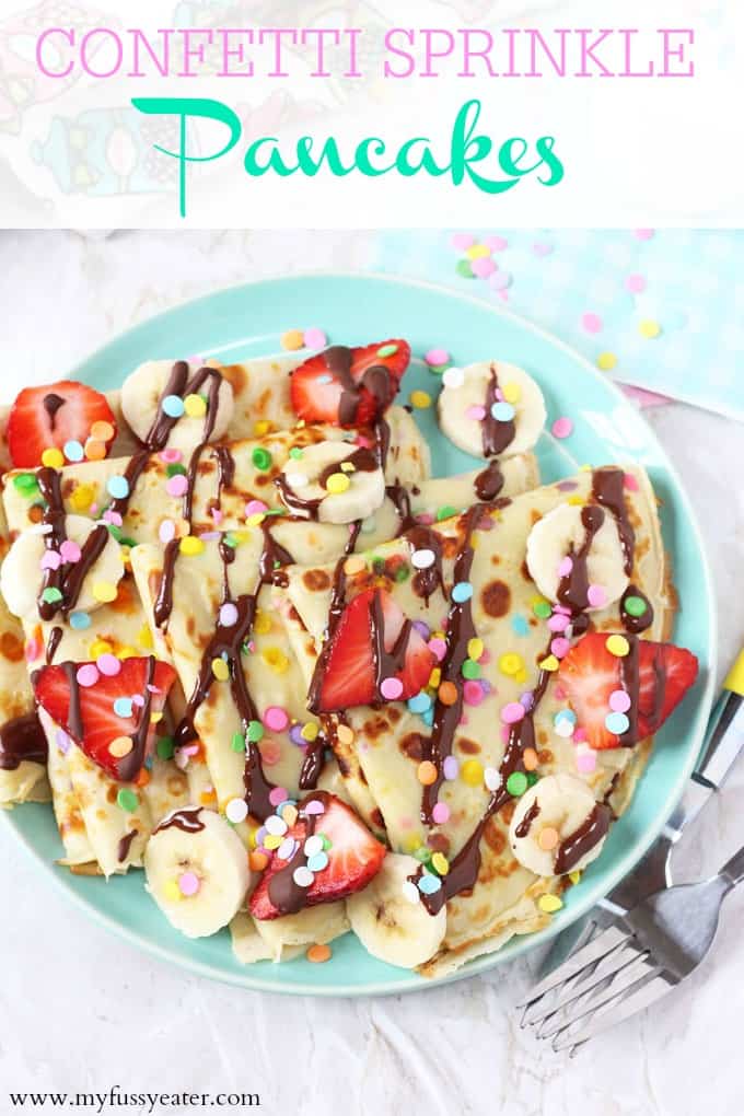Pancakes made super fun for kids with confetti sprinkles and topped with bananas, strawberries and chocolate! My Fussy Eater blog