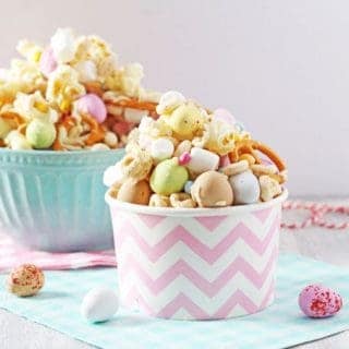 The kids will love to get involved in making this fun and delicious Easter Bunny Trail Mix. It can also be packaged up into paper cups or bags and makes a great edible Easter gift!