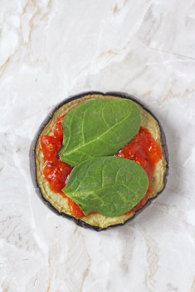 basil leaves added to the aubergine slice