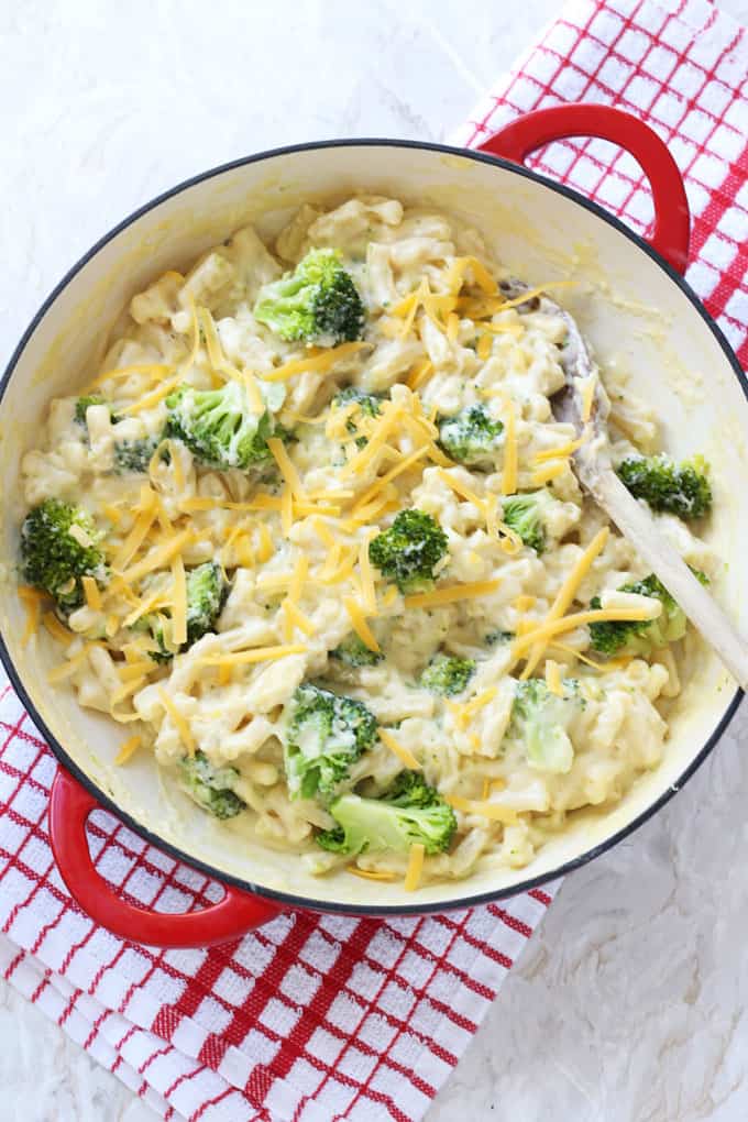 Broccoli Mac & Cheese in a red oven proof bowl