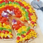 Quick and easy Rainbow Vegetable Tortilla Pizza. Ready in just 10 minutes they're a great healthy alternative to regular pizza that kids will love!