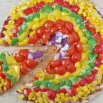 Quick and easy Rainbow Vegetable Tortilla Pizza. Ready in just 10 minutes they're a great healthy alternative to regular pizza that kids will love!