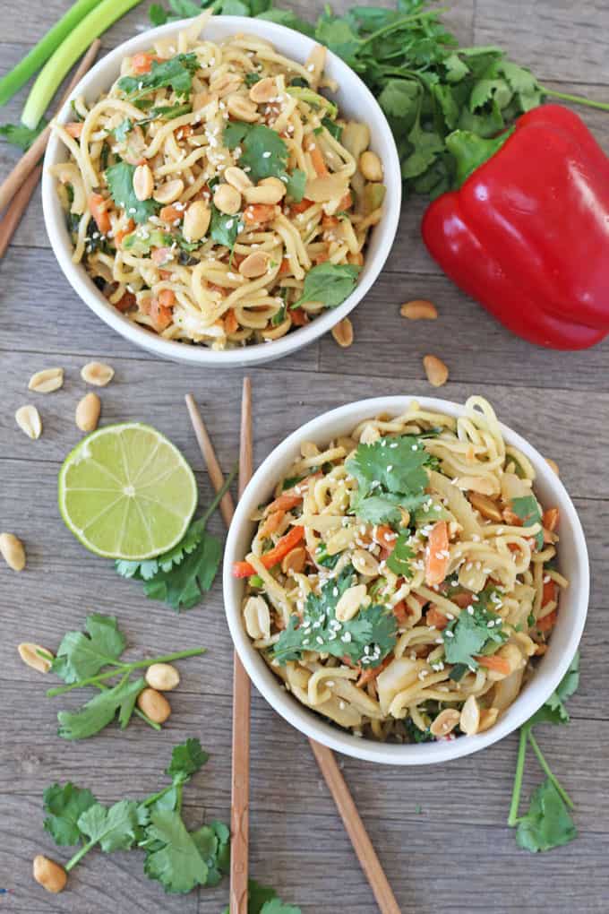 satay vegetable noodles served in 2 bowls