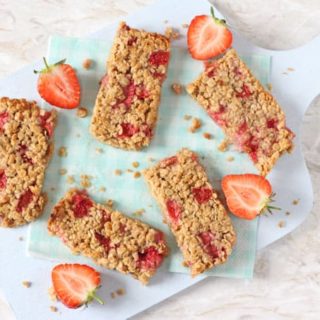 A delicious soft oat bars packed full with sweet strawberries. A tasty and healthy snack for toddlers and older kids!