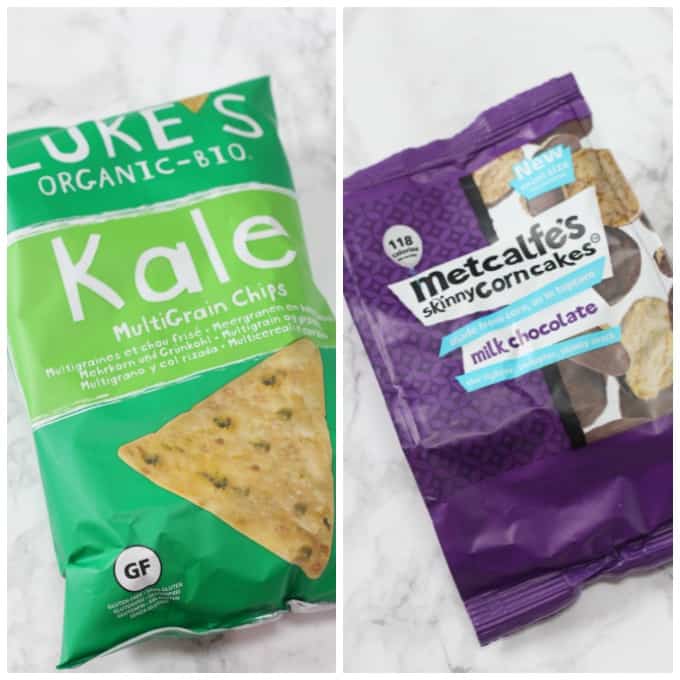 a packet of kale chips alongside a packet of milk chocolate covered rice cakes