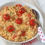 A delicious and kid-friendly Cheese & Tomato Risotto recipe, cooked in the oven to make it super easy!