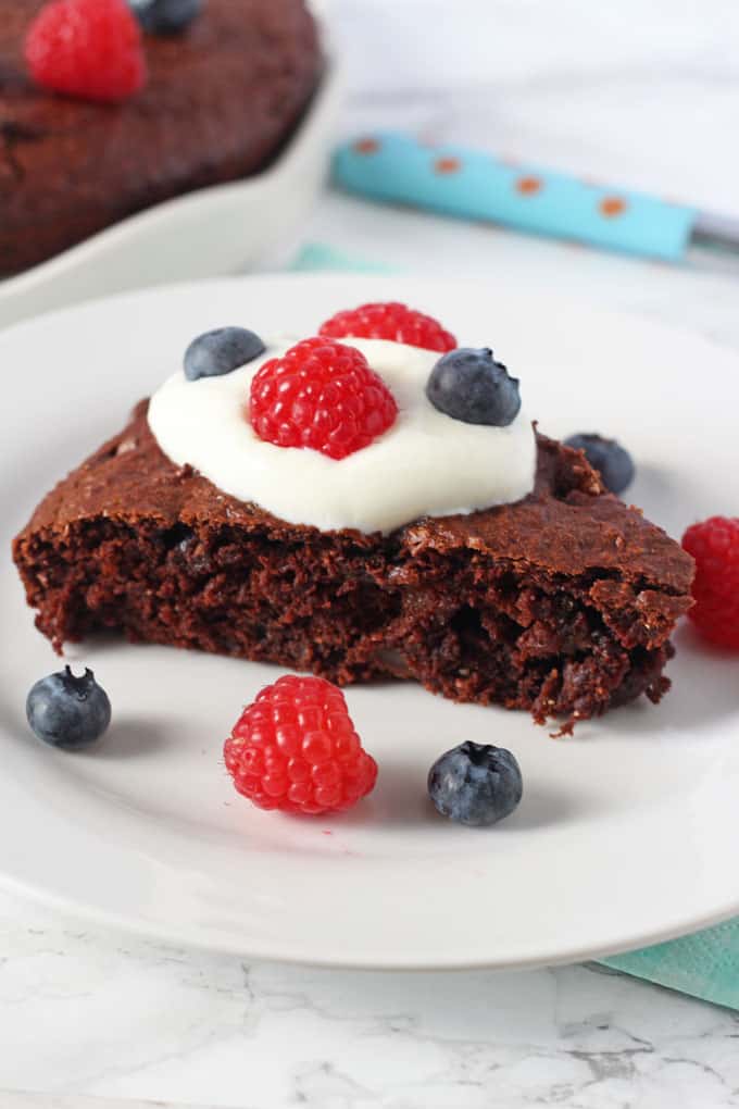 sweet potato chocolate cake served with berries and greek yoghurt