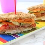 Packed with chicken, hummus and veggies this Club Sandwich makes a really tasty and healthy lunch recipe for kids!