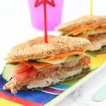 Packed with chicken, hummus and veggies this Club Sandwich makes a really tasty and healthy lunch recipe for kids!