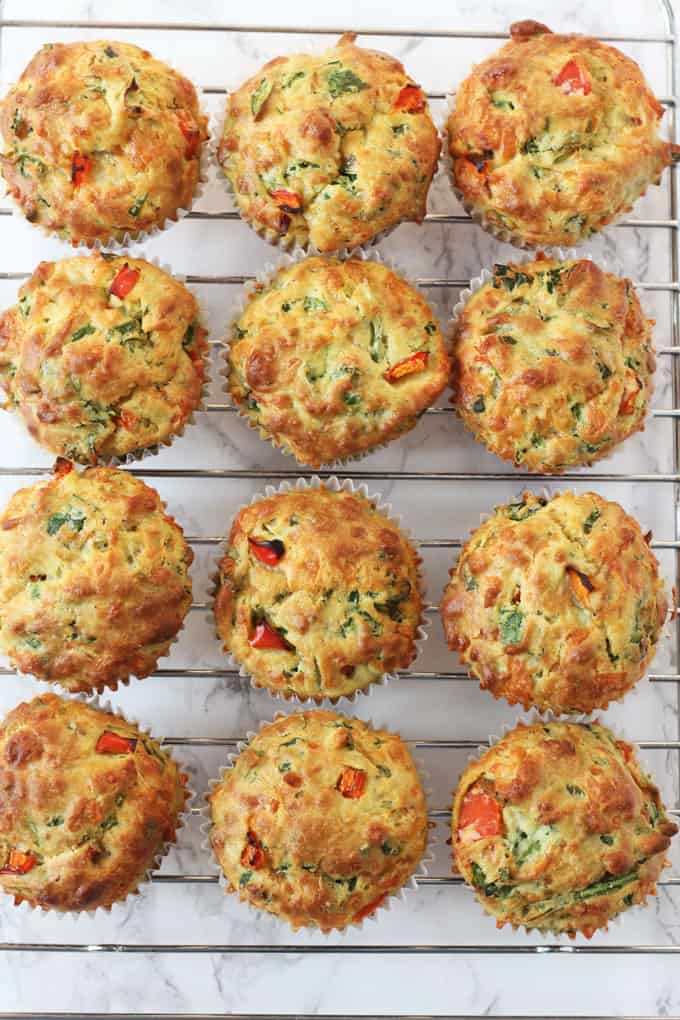 Savoury lunchbox muffins fresh out of the oven and left to cool on a wire rack.