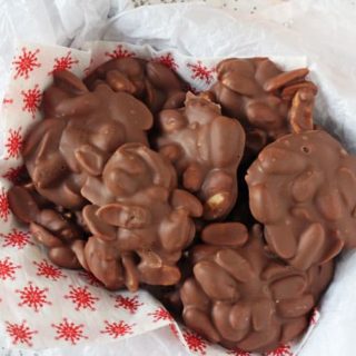 These super easy two ingredient Chocolate Peanut Clusters make the perfect last minute edible gift or snack idea this Christmas!