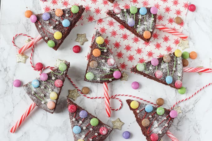 Christmas Tree Chocolate Confection Pops decorated with snacks canes, smarties, icing and edible metallic balls