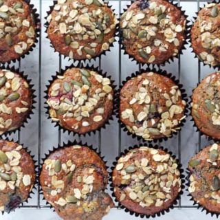 Delicious and filling Berry Breakfast Muffins packed full of healthy ingredients including oats, yogurt, coconut oil, banana and apple sauce.