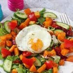 An easy and delicious Winter Butternut Squash Salad recipe, super quick to make and topped with a tasty fried egg!