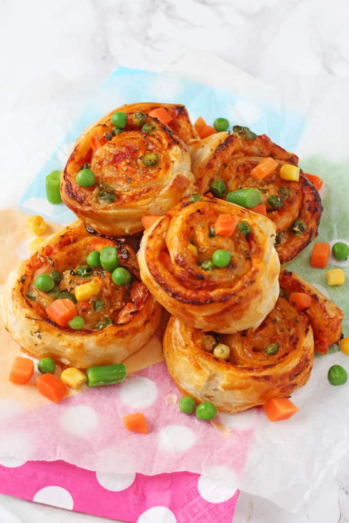 Super easy to make and packed with mixed vegetables, these Veggie Pizza Puff Pastry Roll Ups are sure to go down a treat with the whole family!