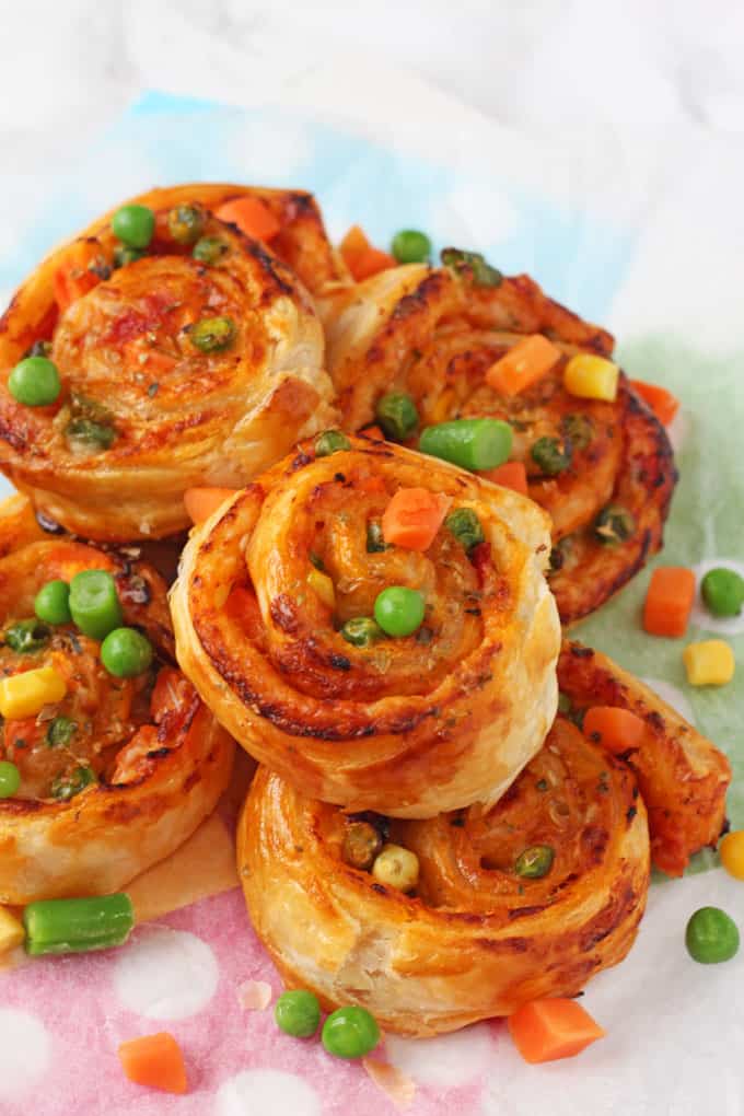 Super easy to make and packed with mixed vegetables, these Veggie Pizza Puff Pastry Roll Ups are sure to go down a treat with the whole family!