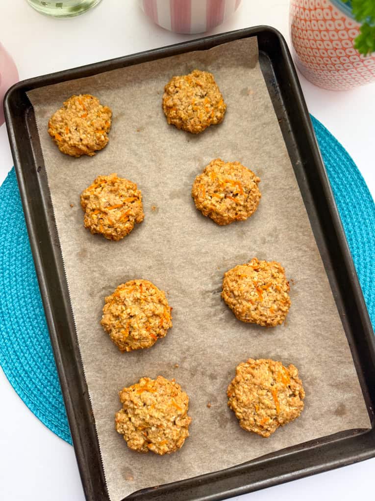 8 Carrot Cake Cookies For Kids on a baking tray that has been lined with baking paper.