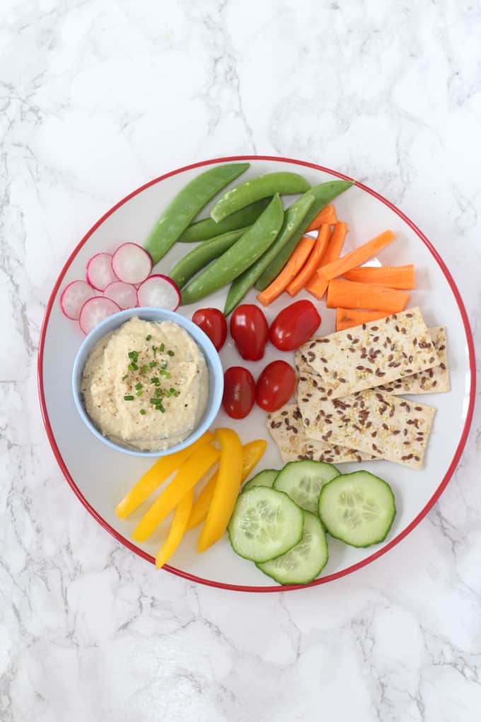 A creamy and cheesy dip made with chickpea and packed full of protein! A great way to get kids to eat their veggies!