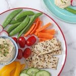 A creamy and cheesy dip made with chickpea and packed full of protein! A great way to get kids to eat their veggies!