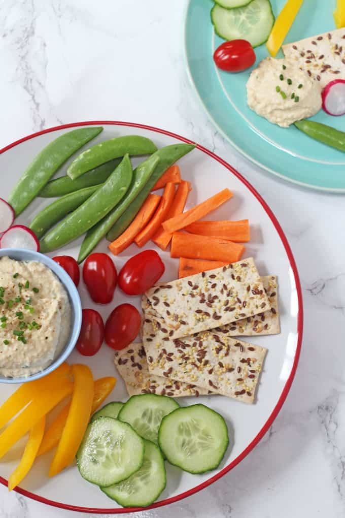 A creamy and cheesy dip made with chickpea and packed full of protein! A great way to get kids to eat their veggies!