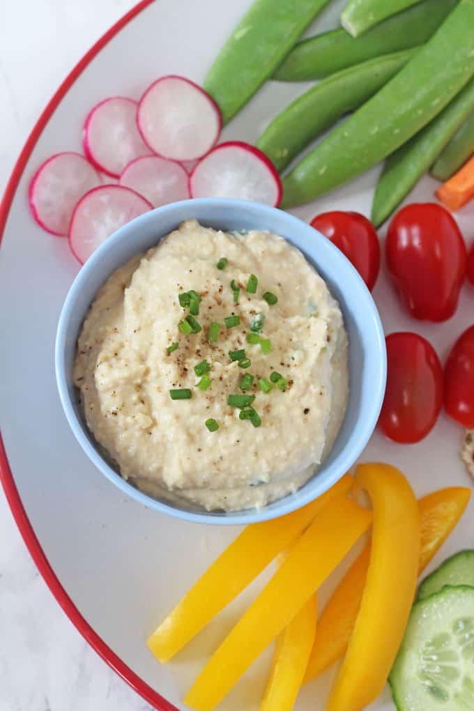 A creamy and cheesy dip made with chickpea and packed full of protein! A great way to get kids to eat their veggies!