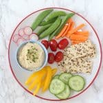 A creamy and cheesy dip made with chickpea and packed full of protein! A great way to get kids to eat their veggies!
