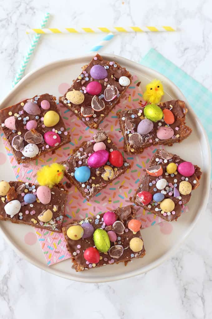 Easter Cornflake Crunch served on a confetti themed napkin with mini easter chick decorations